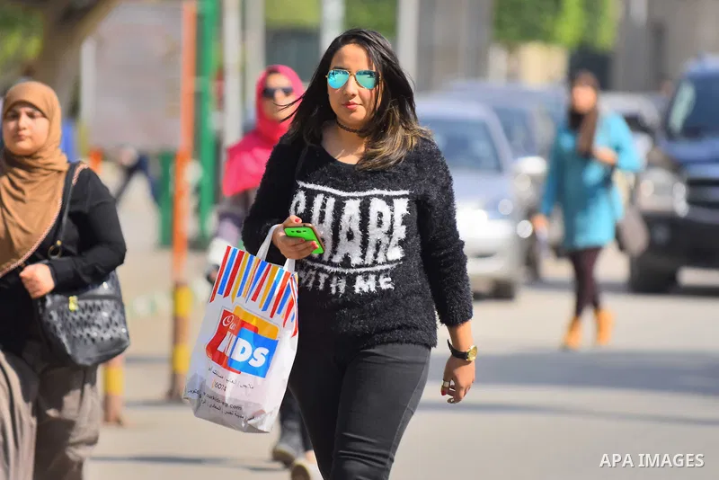 Egyptian students celebrate on Valentine's day at Cairo University, in Cairo on February 14, 2016. Valentine's Day is increasingly popular in the region as people have taken up the custom of giving flowers, cards, chocol...