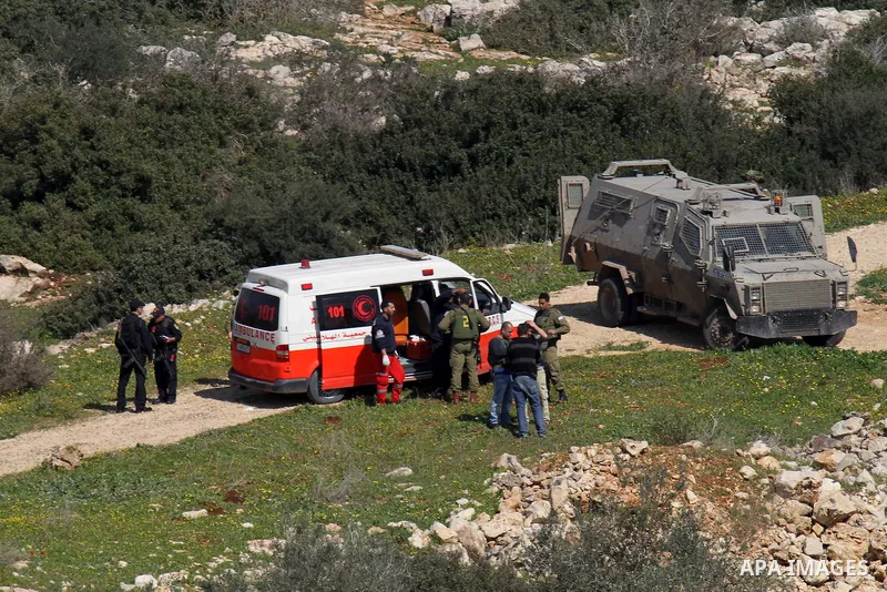 Israeli security forces inspect the area where two Palestinian teenagers were shot dead by security forces as they reported fired on Israeli soldiers on February 14, 2016 in the village of Araka, West of Jenin in the Isr...