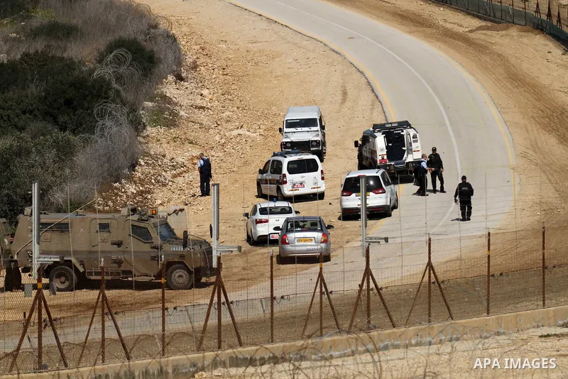 Israeli security forces inspect the area where two Palestinian teenagers were shot dead by security forces as they reported fired on Israeli soldiers on February 14, 2016 in the village of Araka, West of Jenin in the Isr...