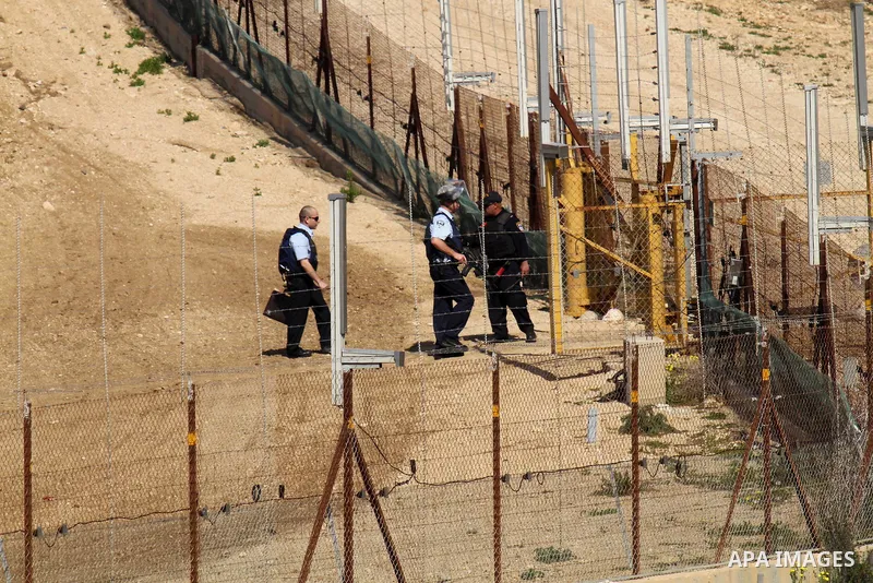 Israeli security forces inspect the area where two Palestinian teenagers were shot dead by security forces as they reported fired on Israeli soldiers on February 14, 2016 in the village of Araka, West of Jenin in the Isr...