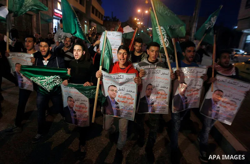 Palestinians take part in a demonstration calling for the release of Mohammed al-Qiq, a Palestinian prisoner on hunger strike, in the West bank city of Hebron on February 16, 2016. Israel's top court rejected Qiq's reque...