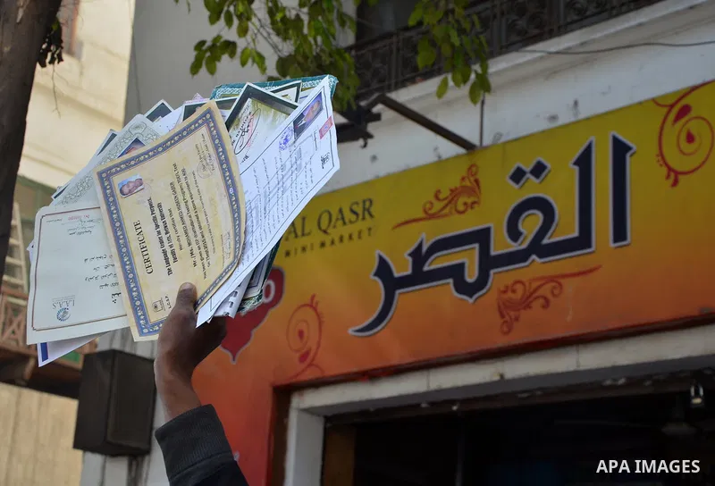 Egyptians take part in a protest to demand jobs in front of the Council of Ministers, in Cairo, Egypt, on February 17, 2016. Photo by Amr Sayed