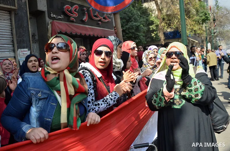 Egyptians take part in a protest to demand jobs in front of the Council of Ministers, in Cairo, Egypt, on February 17, 2016. Photo by Amr Sayed