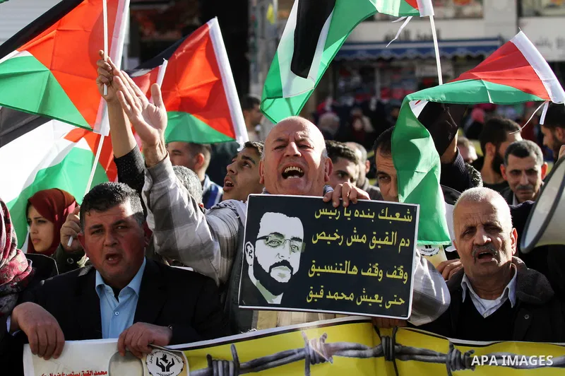 Palestinians take part in a demonstration calling for the release of Mohammed al-Qiq, a Palestinian prisoner on hunger strike, in the West bank city of Nablus on February 17, 2016. Israel's top court rejected Qiq's reque...