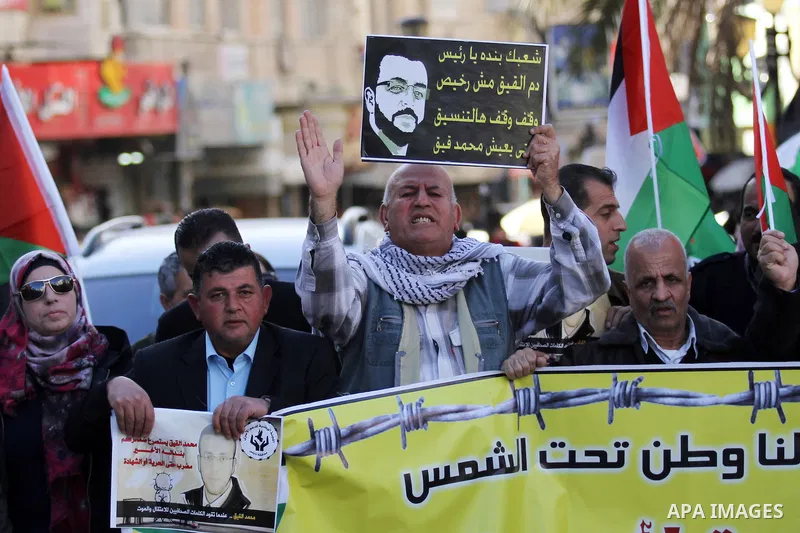 Palestinians take part in a demonstration calling for the release of Mohammed al-Qiq, a Palestinian prisoner on hunger strike, in the West bank city of Nablus on February 17, 2016. Israel's top court rejected Qiq's reque...