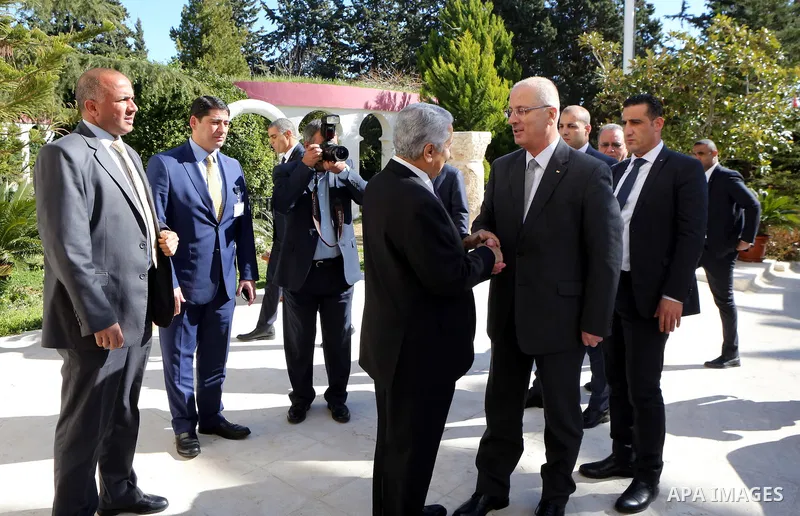 Palestinian Prime Minister Rami Hamdallah meets with Jordanian Prime Minister Abdullah Ensour during his visit in Amman, Jordan, on Feb. 17, 2016. Photo by Prime Minister Office