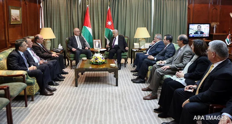 Palestinian Prime Minister Rami Hamdallah meets with Jordanian Prime Minister Abdullah Ensour during his visit in Amman, Jordan, on Feb. 17, 2016. Photo by Prime Minister Office