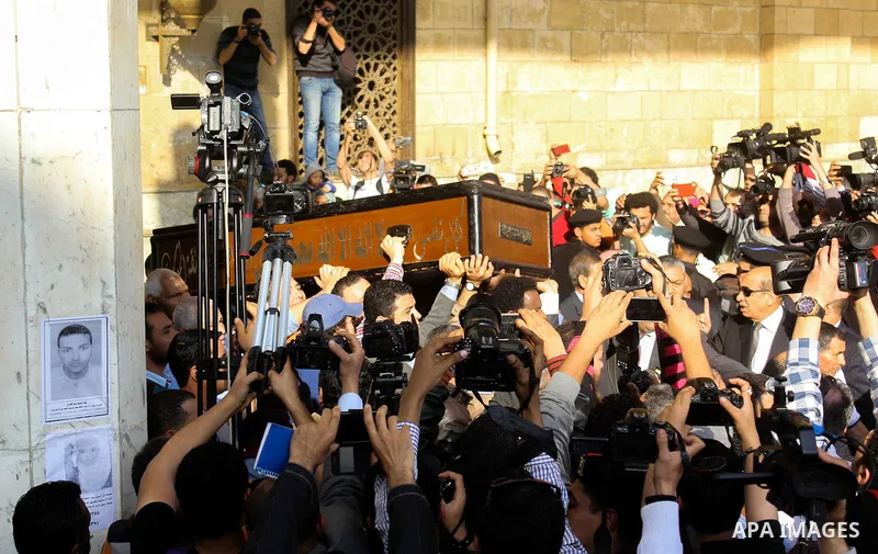 Egyptians mourners carrying the coffin of the Egyptian journalist mohammed Hassanein Heikal during his funeral at the al-Hussein mosque in Cairo on February 17, 2016. Heikal, one of the Arab world's most prominent politi...