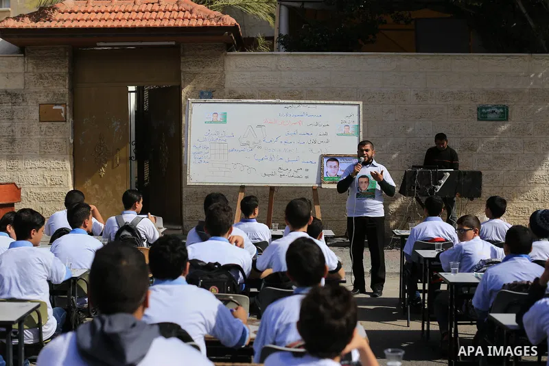 Palestinian students take part in a demonstration calling for the release of Mohammed al-Qiq, a Palestinian prisoner on hunger strike, in front of Red cross office in Gaza city, on February 18, 2016. Israel's top court r...