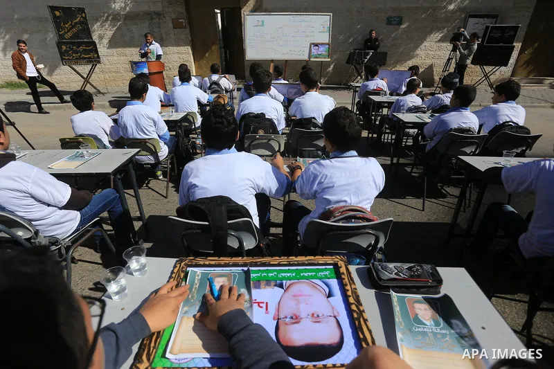 Palestinian students take part in a demonstration calling for the release of Mohammed al-Qiq, a Palestinian prisoner on hunger strike, in front of Red cross office in Gaza city, on February 18, 2016. Israel's top court r...