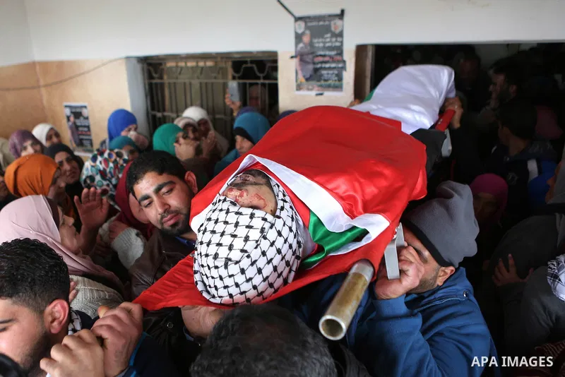 Mourners carry the body of Abed Hammad, 20, who was shot dead by Israeli forces, during his funeral in the West Bank village of Silwad, Feb. 20, 2016. Hammad was one of three Palestinians to be killed by Israeli forces o...