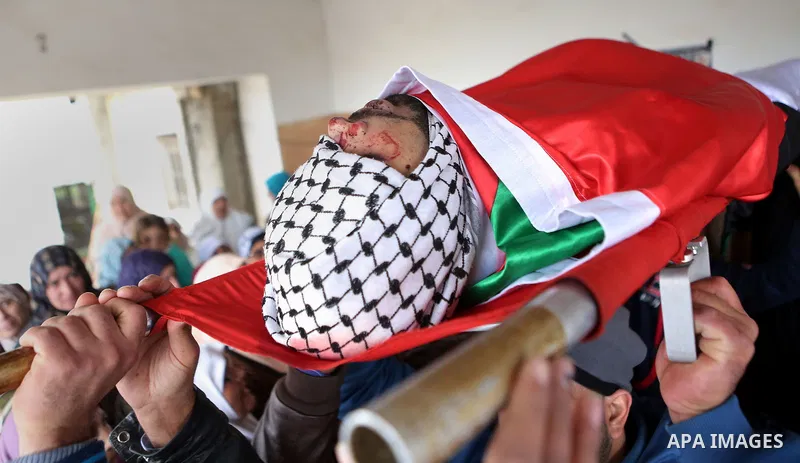 Mourners carry the body of Abed Hammad, 20, who was shot dead by Israeli forces, during his funeral in the West Bank village of Silwad, Feb. 20, 2016. Hammad was one of three Palestinians to be killed by Israeli forces o...