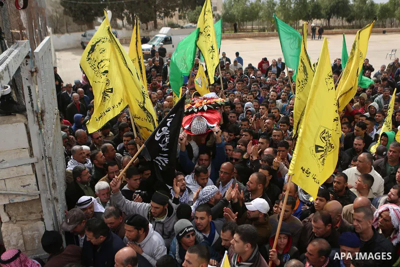 Mourners carry the body of Abed Hammad, 20, who was shot dead by Israeli forces, during his funeral in the West Bank village of Silwad, Feb. 20, 2016. Hammad was one of three Palestinians to be killed by Israeli forces o...