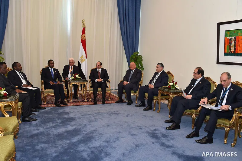 A handout photograph made available by the Egyptian Presidency shows shows Egyptian President Abdel Fattah al-Sisi (R) meeting with Equatorial Guinea's President Teodoro Obiang Nguema Mbasogo after the opening session of...