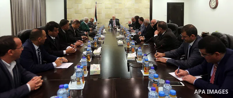 Palestinian Prime Minister Rami Hamdallah meets with a delegation of representatives of the private sector in the Gaza Strip at his office in the West Bank city of Ramallah, on Feb. 22, 2016. Photo by Prime Minister Offi...
