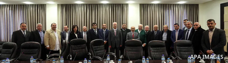 Palestinian Prime Minister Rami Hamdallah meets with a delegation of representatives of the private sector in the Gaza Strip at his office in the West Bank city of Ramallah, on Feb. 22, 2016. Photo by Prime Minister Offi...
