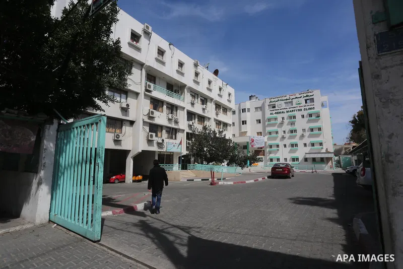 A Palestinian man walks past a closed school during the strike of the employees of former Palestinian government in Gaza Strip and West bank to demand for pay their salaries, in Gaza city on February 25, 2016. Photo by M...