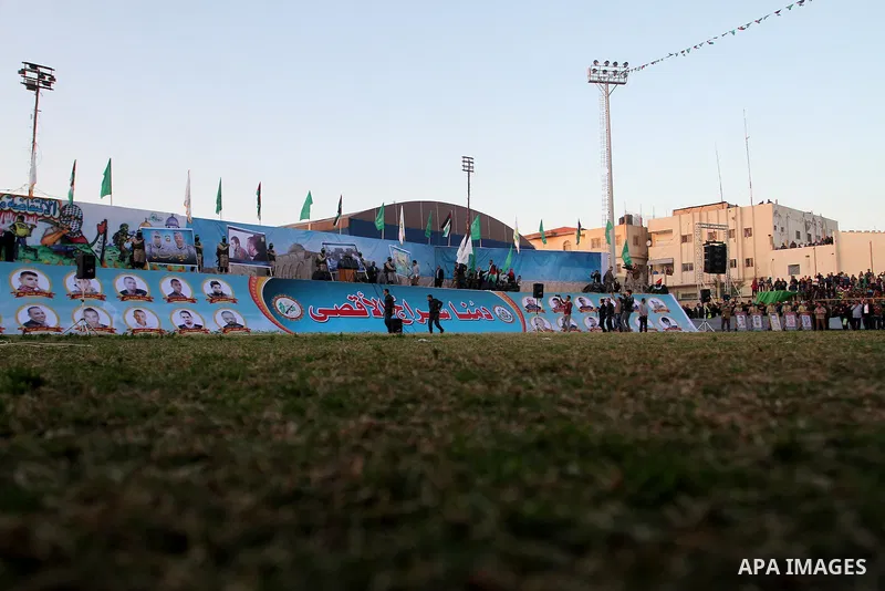 Palestinian militants of the Ezzedine al-Qassam Brigades, the armed wing of the Hamas movement, take part in an anti-Israel rally on February 26, 2016, in the southern Gaza Strip town of Rafah. Photo by Abed Rahim Khatib