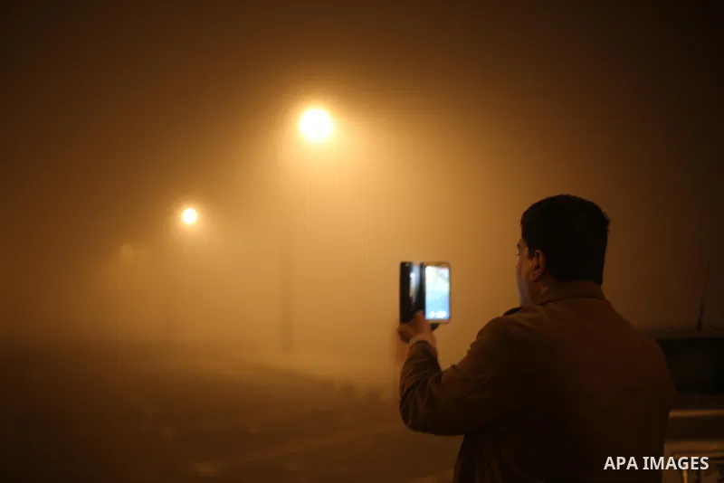 A Palestinian man takes a selfie at a street during foggy weather in Gaza City, The Gaza Strip, 27 February 2016. Photo by Mohammed Asad