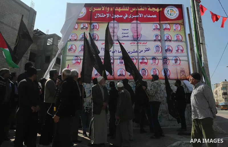 Palestinians take part in a protest demanding release the prisoners in Israeli jails, in Gaza city, on February 28, 2016. Photo by Mohammed Asad