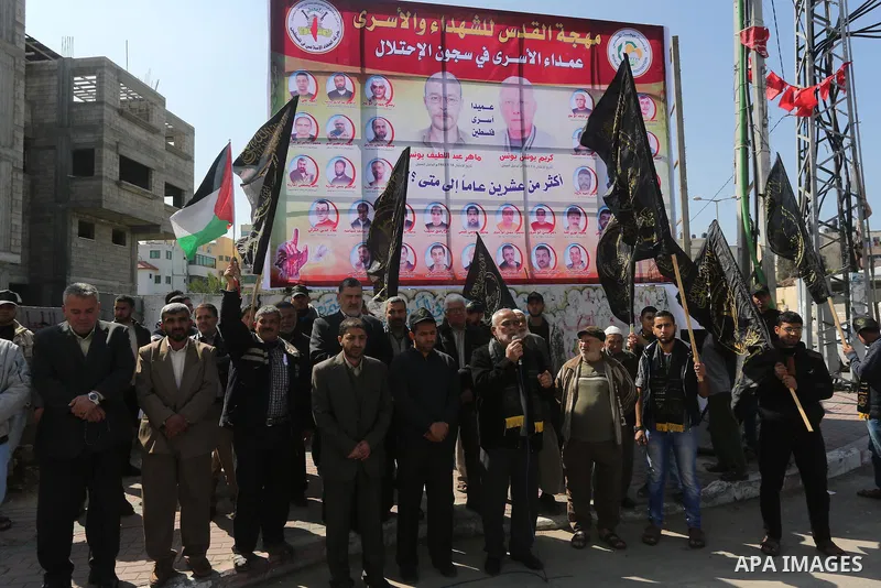 Palestinians take part in a protest demanding release the prisoners in Israeli jails, in Gaza city, on February 28, 2016. Photo by Mohammed Asad