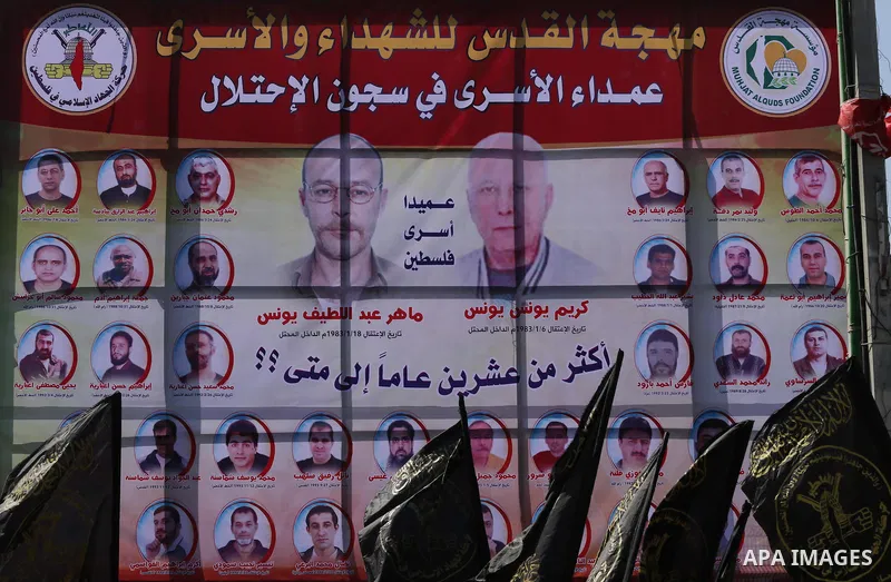 Palestinians take part in a protest demanding release the prisoners in Israeli jails, in Gaza city, on February 28, 2016. Photo by Mohammed Asad