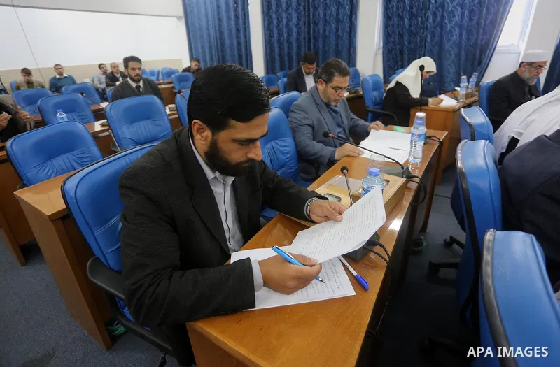 Members of the Palestinian legislative council from Hamas movement attend a meeting at the legislative council, in Gaza city, on February 28, 2016. Photo by Mohammed Asad