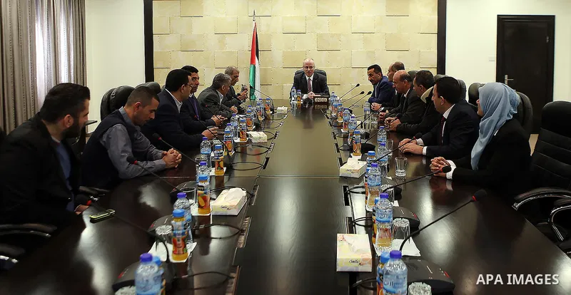 Palestinian Prime Minister, Rami Hamdallah, meets with Members of the teachers' union, in the West Bank city of Ramallah, on February 28, 2016. Photo by Prime Minister Office