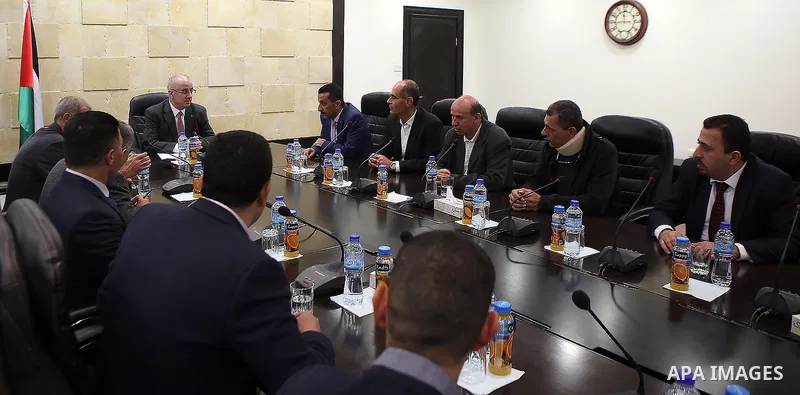 Palestinian Prime Minister, Rami Hamdallah, meets with Members of the teachers' union, in the West Bank city of Ramallah, on February 28, 2016. Photo by Prime Minister Office