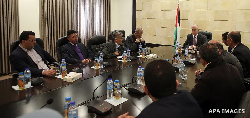 Palestinian Prime Minister, Rami Hamdallah, meets with Members of the teachers' union, in the West Bank city of Ramallah, on February 28, 2016. Photo by Prime Minister Office