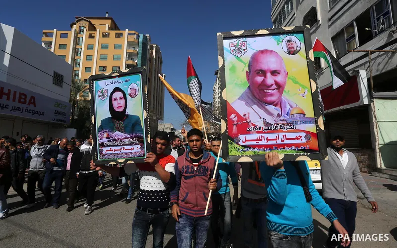 Palestinians take part in a protest demanding release the prisoners in Israeli jails, in Gaza city, on February 29, 2016. Photo by Mohammed Asad