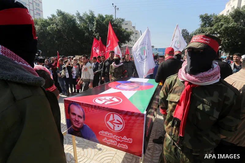 Palestinians take part in a symbolic funeral for the Palestinian prisoner Omar El-Nayef, in Gaza city on Feb. 29, 2016. A Palestinian man who escaped from an Israeli prison after being convicted of a 1986 murder has been...