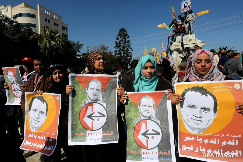 Palestinians take part in a protest demanding release the prisoners in Israeli jails, in Gaza city, on February 29, 2016. Photo by Mohammed Asad