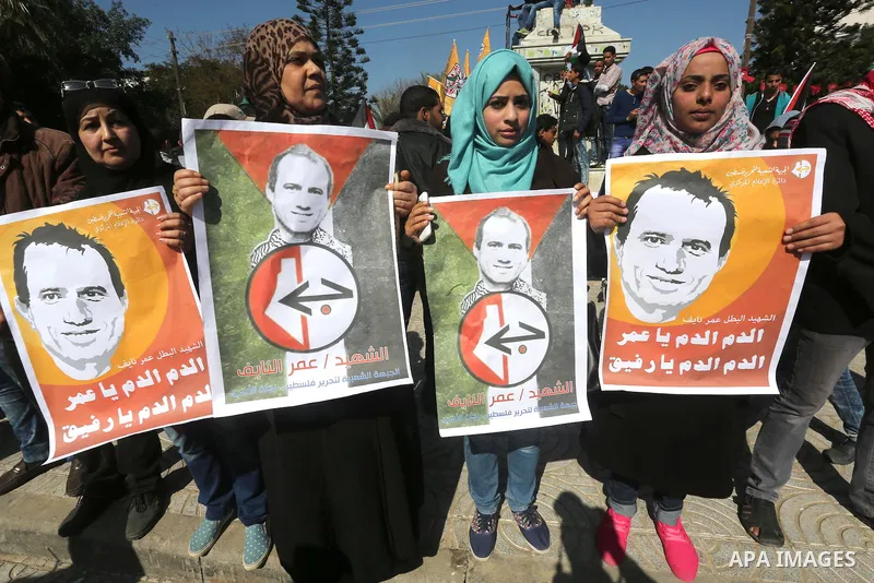 Palestinians take part in a protest demanding release the prisoners in Israeli jails, in Gaza city, on February 29, 2016. Photo by Mohammed Asad