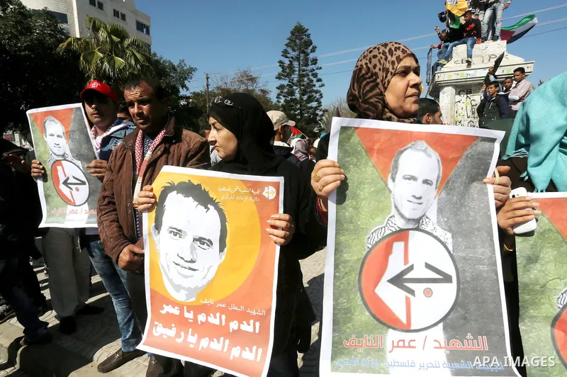 Palestinians take part in a protest demanding release the prisoners in Israeli jails, in Gaza city, on February 29, 2016. Photo by Mohammed Asad