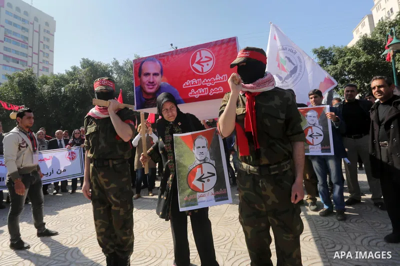 Palestinians take part in a symbolic funeral for the Palestinian prisoner Omar El-Nayef, in Gaza city on Feb. 29, 2016. A Palestinian man who escaped from an Israeli prison after being convicted of a 1986 murder has been...