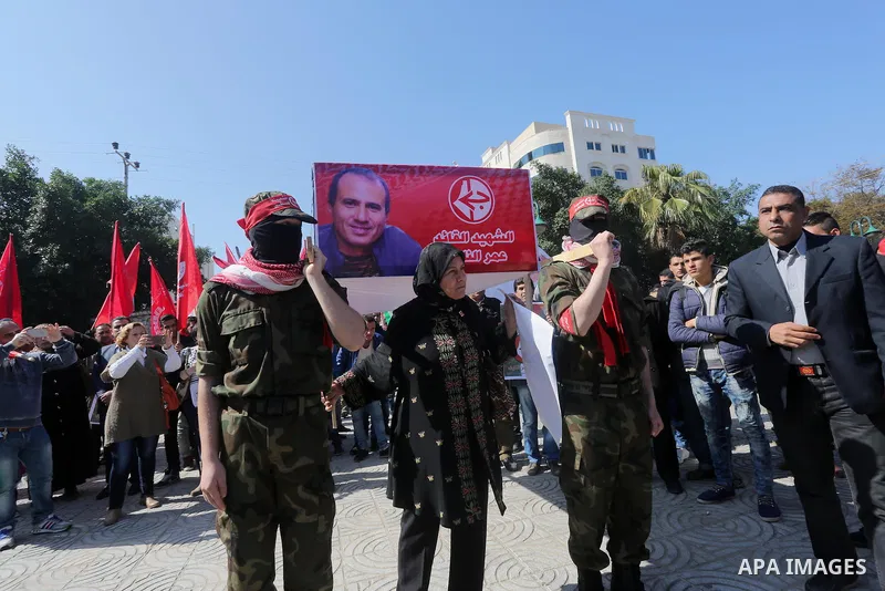 Palestinians take part in a symbolic funeral for the Palestinian prisoner Omar El-Nayef, in Gaza city on Feb. 29, 2016. A Palestinian man who escaped from an Israeli prison after being convicted of a 1986 murder has been...