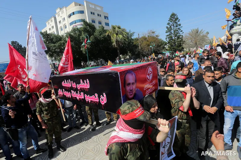Palestinians take part in a symbolic funeral for the Palestinian prisoner Omar El-Nayef, in Gaza city on Feb. 29, 2016. A Palestinian man who escaped from an Israeli prison after being convicted of a 1986 murder has been...