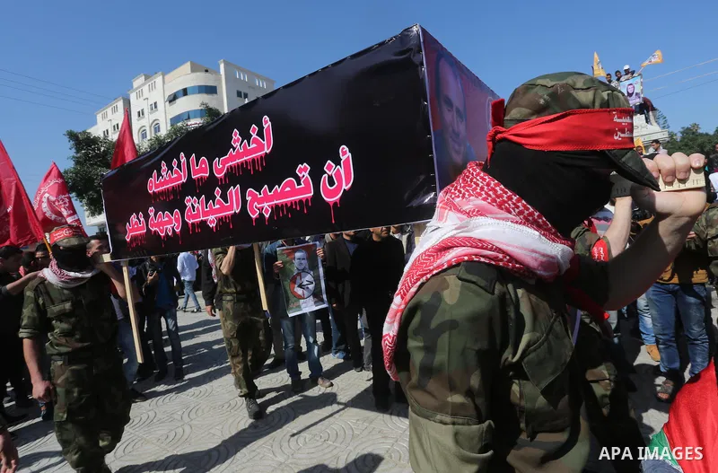 Palestinians take part in a symbolic funeral for the Palestinian prisoner Omar El-Nayef, in Gaza city on Feb. 29, 2016. A Palestinian man who escaped from an Israeli prison after being convicted of a 1986 murder has been...