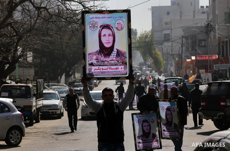Palestinians take part in a protest demanding release the prisoners in Israeli jails, in Gaza city, on February 29, 2016. Photo by Mohammed Asad