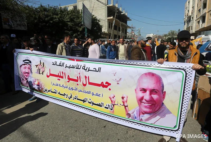 Palestinians take part in a protest demanding release the prisoners in Israeli jails, in Gaza city, on February 29, 2016. Photo by Mohammed Asad