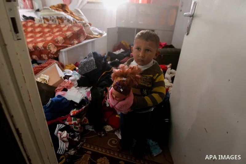 Palestinians check their belongings after a raid by the Israeli army on some Palestinian houses in the West Bank city of Hebron, 29 February 2016, The Israeli army announced arresting 16 Palestinian in Hebron and locatin...