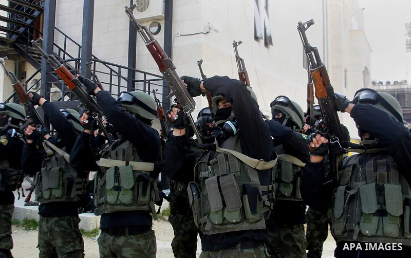 Members of Palestinian national security forces show their skills during a military training, in the West Bank city of Hebron, on March 2, 2016. Photo by Wisam Hashlamoun