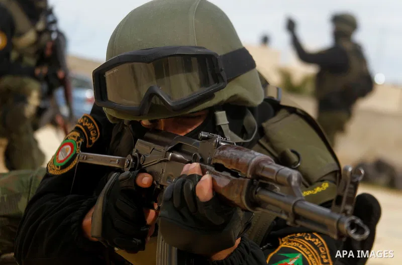 Members of Palestinian national security forces show their skills during a military training, in the West Bank city of Hebron, on March 2, 2016. Photo by Wisam Hashlamoun