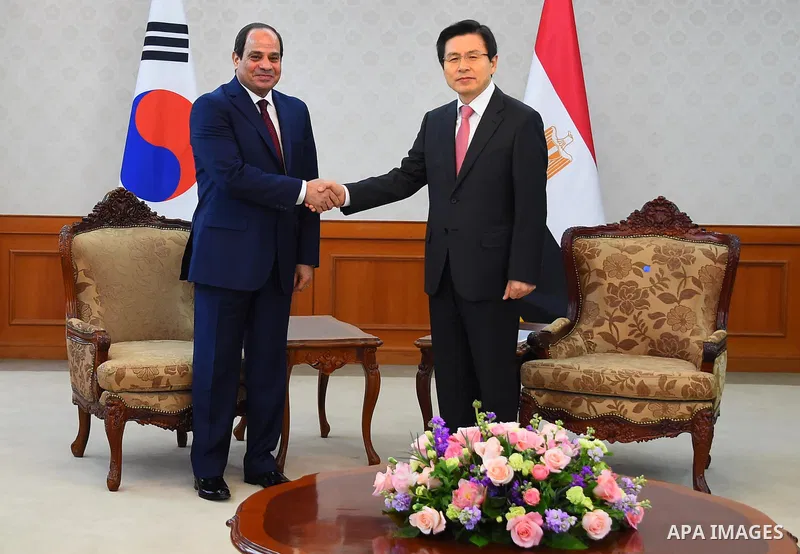 South Korean Prime Minister Hwang Kyo-ahn (R) and Egyptian President Abdel Fattah al-Sisi shake hands during their meeting in Seoul, South Korea, 03 March 2016. Egypt's President Abdel Fattah al-Sisi is in South Korea on...