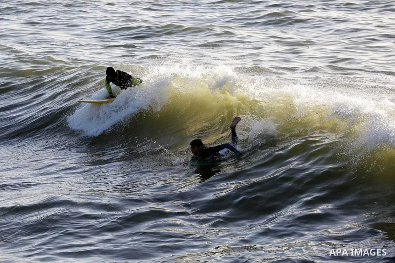 Palestinian youth enjoy water skiing in the Mediterranean Sea in Gaza City on on March 04, 2016. Photo by Mohammed Asad