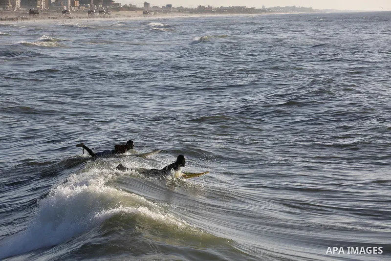 Palestinian youth enjoy water skiing in the Mediterranean Sea in Gaza City on on March 04, 2016. Photo by Mohammed Asad