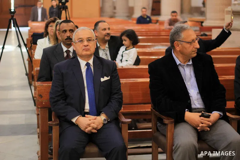 Egypt's Tourism Minister Hisham Zaazou attends a mass in memory of Italian PhD student Guilio Regeni, who was tortured and killed in the capital in January, at Saint Joseph's Roman Catholic Church in Cairo, Egypt March 5...