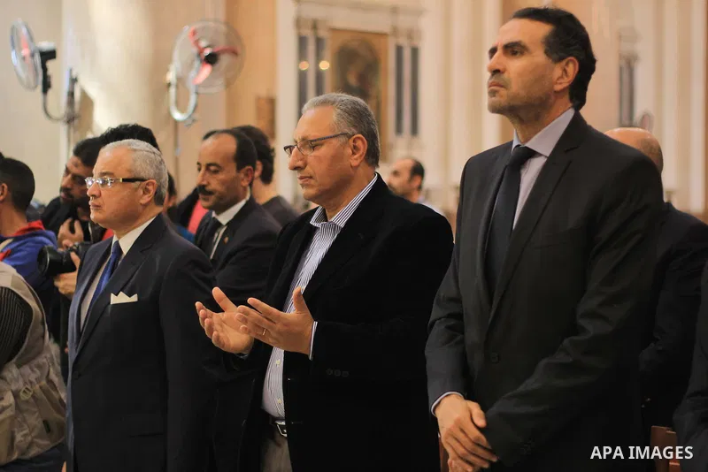 Egypt's Tourism Minister Hisham Zaazou attends a mass in memory of Italian PhD student Guilio Regeni, who was tortured and killed in the capital in January, at Saint Joseph's Roman Catholic Church in Cairo, Egypt March 5...
