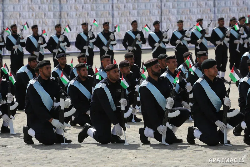 Palestinian members of officers display their skills during a graduation ceremony, in Gaza city, on March 6, 2016. Photo by Mohammed Asad